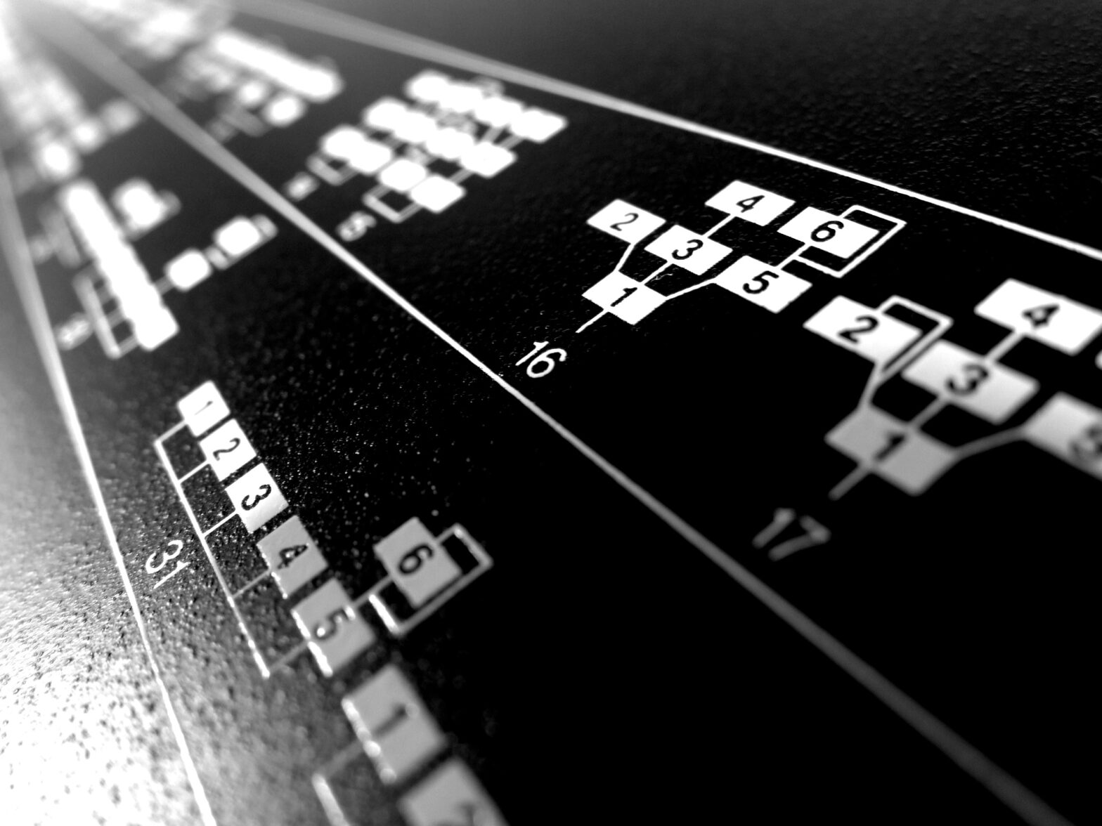 closeup of DX7 algorithm illustrations on front cover of instrument